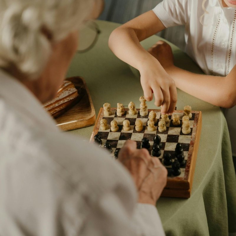 two people playing chess