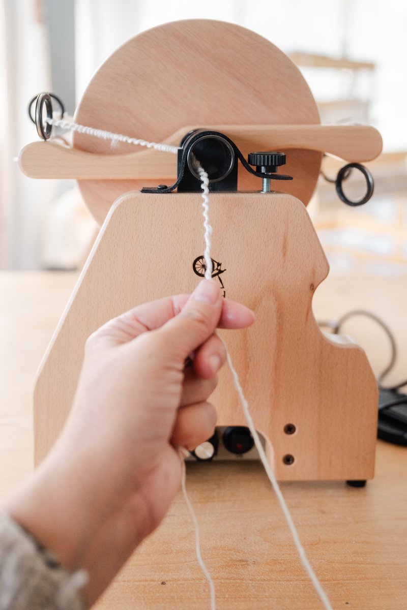 E-Spinner vs Treadle Spinning Wheel - Thread Collective Australia