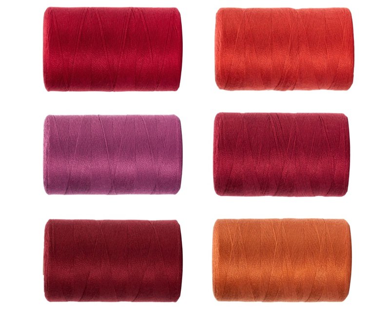 Maurice Brassard Tencel yarns in shades of red, orange, and rich jewel tones (Source: Thread Collective)
