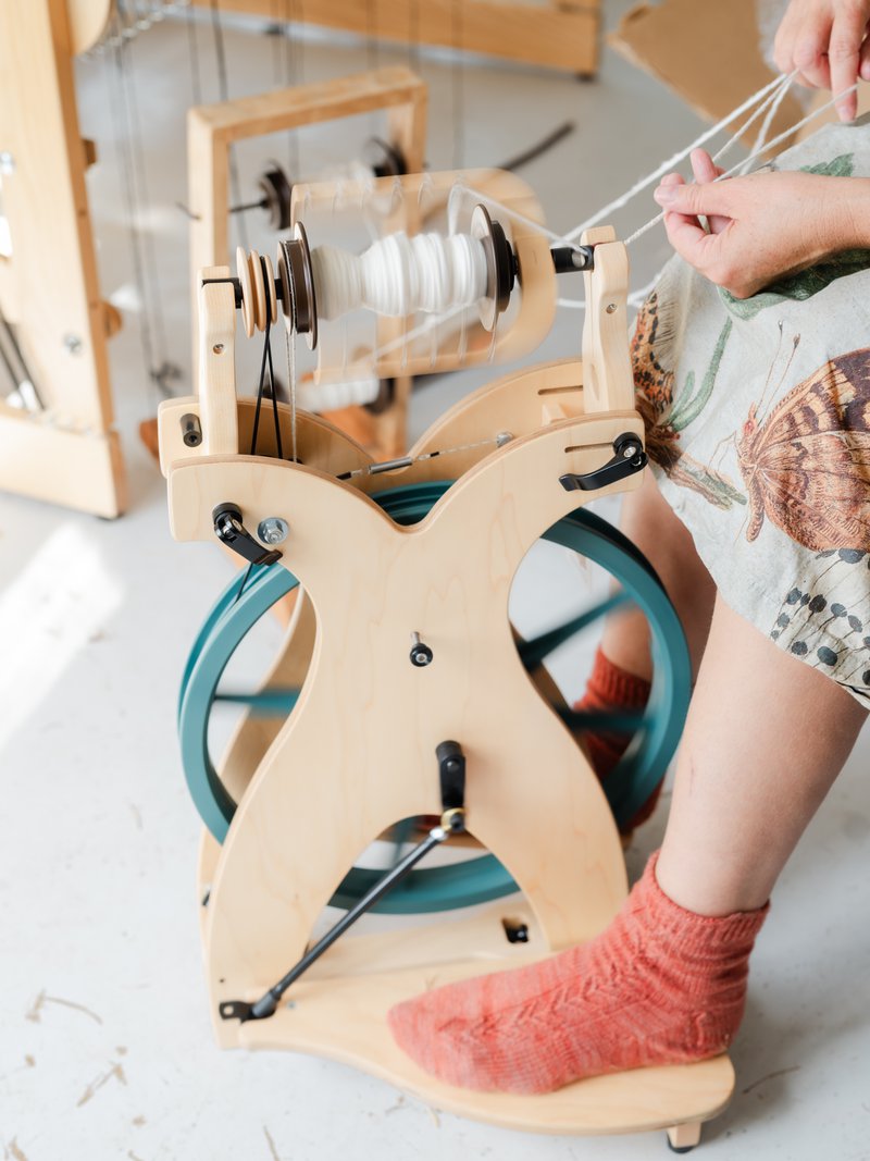 Plying handspun cotton on a Schacht Sidekick spinning wheel (Source: Samantha Gehrmann)