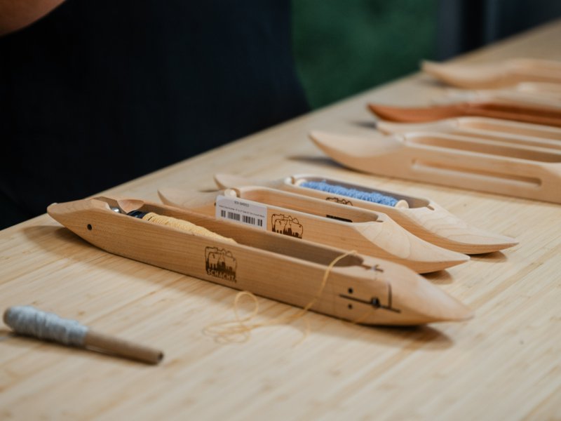 Various types of weaving shuttles with bobbins, pirns, and quills (Source: Thread Collective)