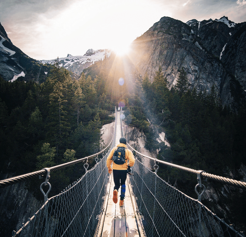 We Were At This Beautiful Brige In Murren , In The Bernese Oberlan In Switzerland With Some Friend, When I Tell My Friend To Run Like If He Would Catch The Last Ray.