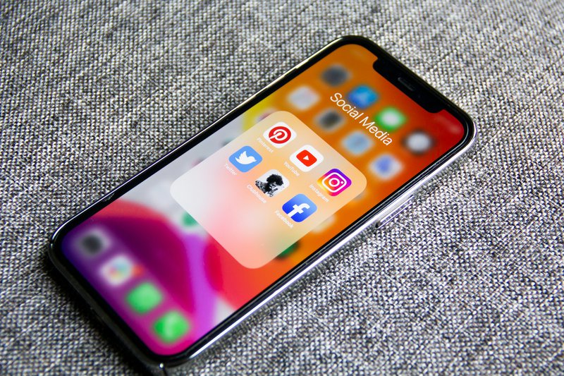 social media icons shown on a smartphone