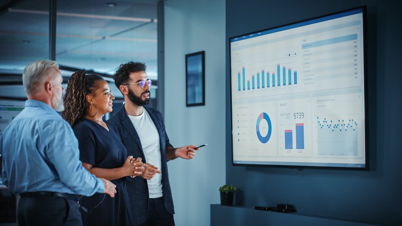 team reviews sales figures