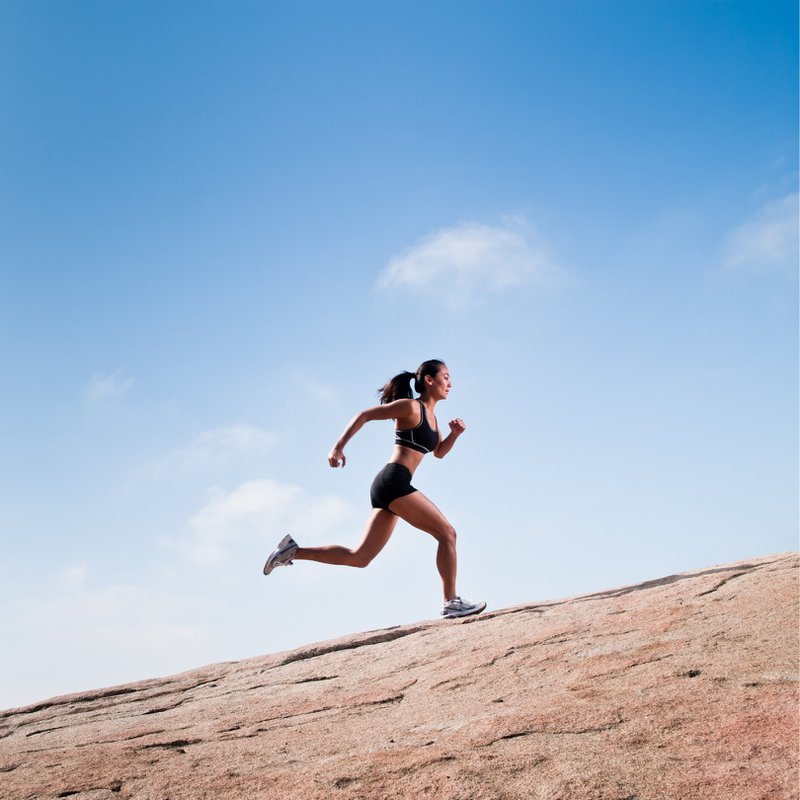 Athlete jogging outdoors, representing the need for EPA and DHA to support recovery, joint health, and mental clarity.