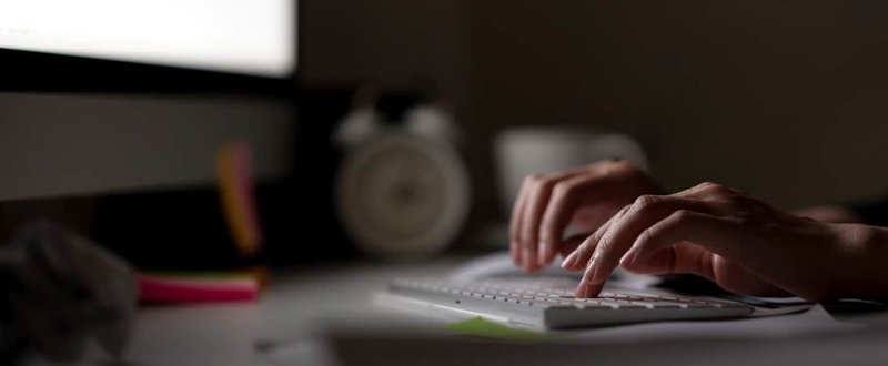 Blogging for small business: typing on keyboard.