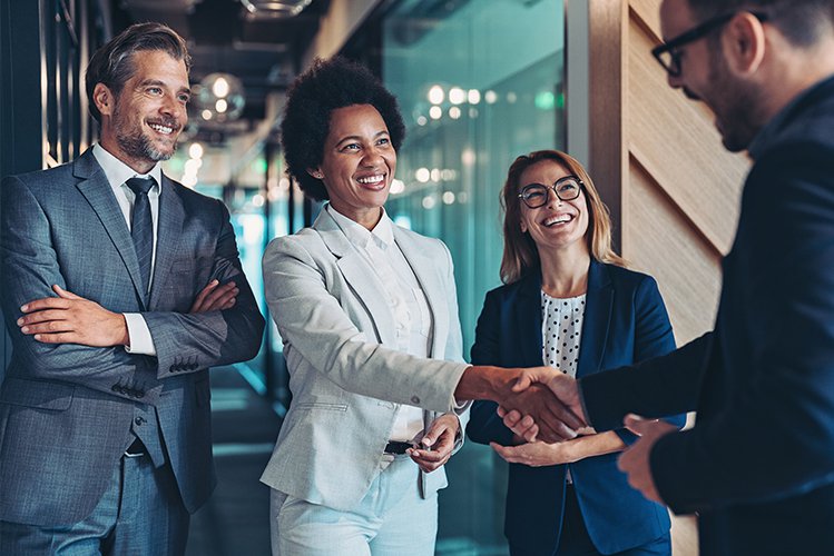 happy employees with Employee Assistance Programs