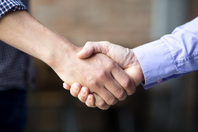 Handshake between two business partners.