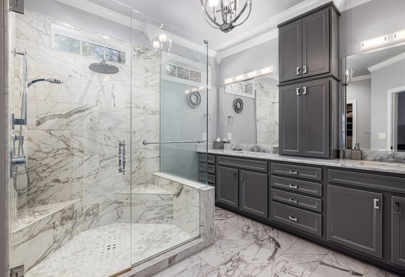 Walk-in bath designs often serve dual purposes. They improve accessibility while also elevating the bathroom’s visual appeal.