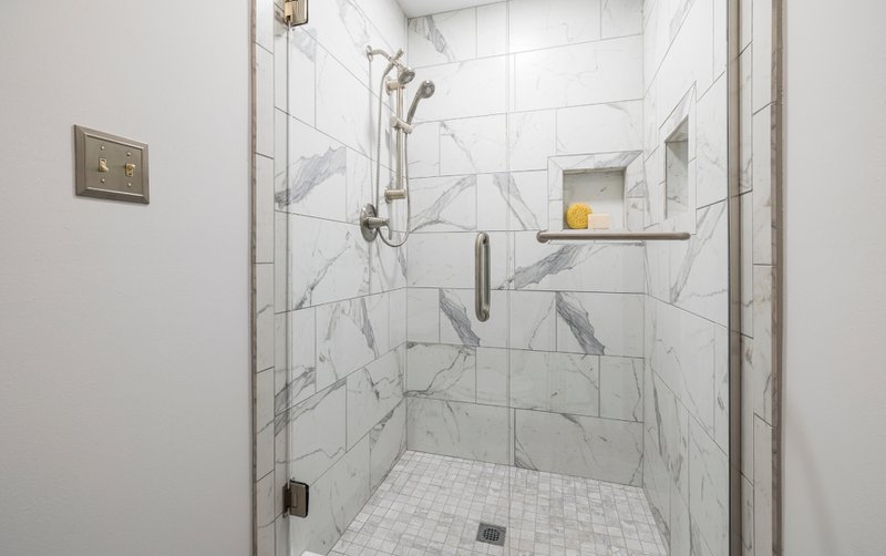 Simulated tile systems address these concerns by offering surfaces that resist moisture, staining, and everyday wear.