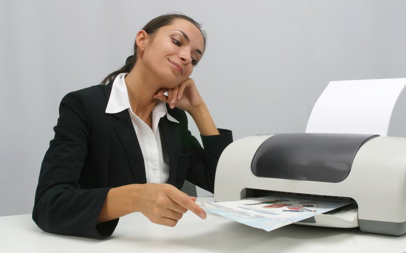 a worker printing documents
