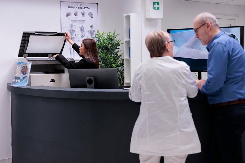 a worker using a copying machine