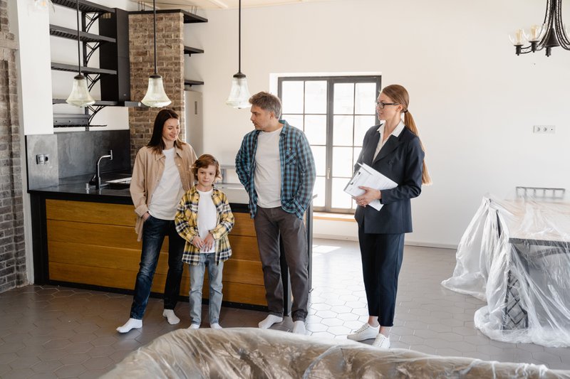 A family looking at a property under a first home buyer program.