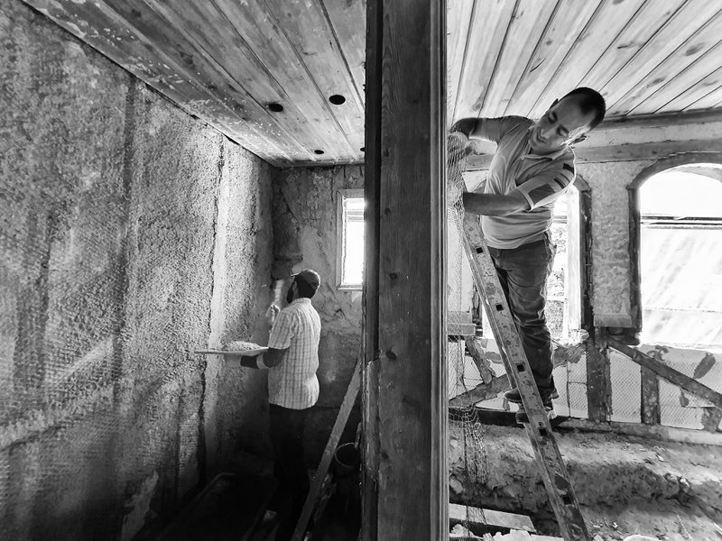 Workers start renovation work, thanks to a home equity loan for remodel by the owners.