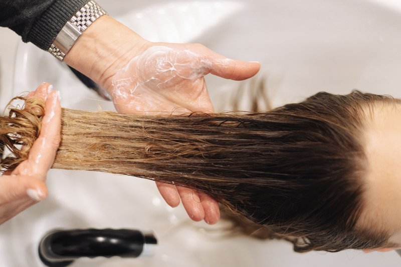 Professional hair wash as a part of a scalp health routine.