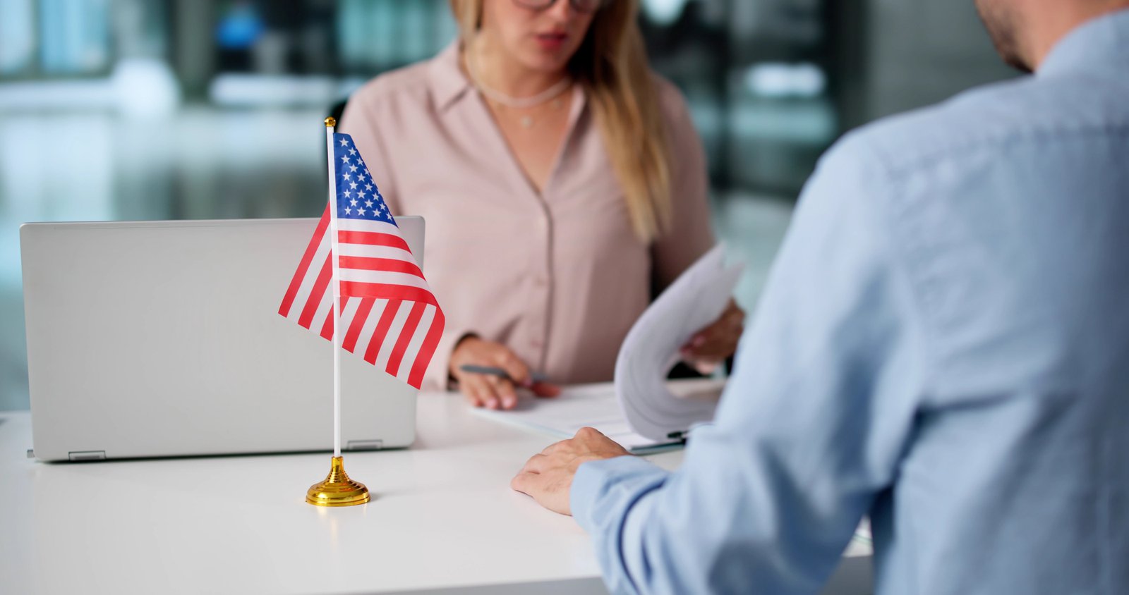 An immigration lawyer assisting with green card renewal.