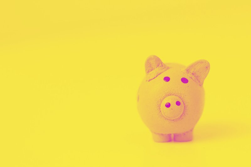 pink pig figurine on white surface