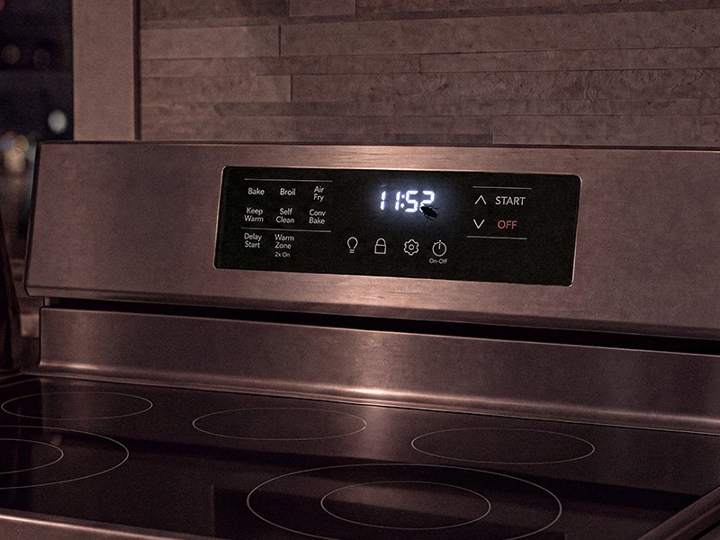 cockroach on stove at night