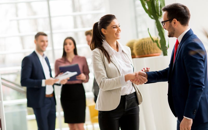Management finalizing their new association digital advertising partner