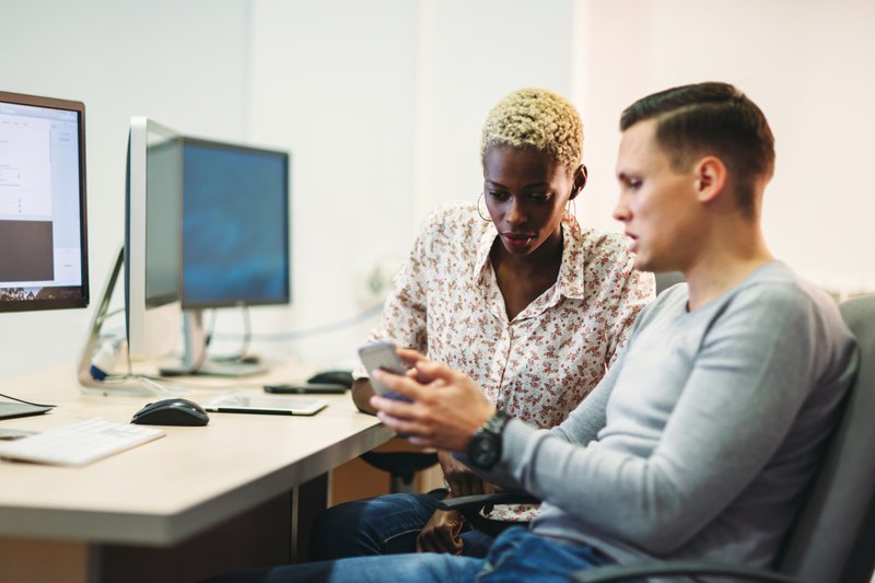 Designer and Developer performing design handoff