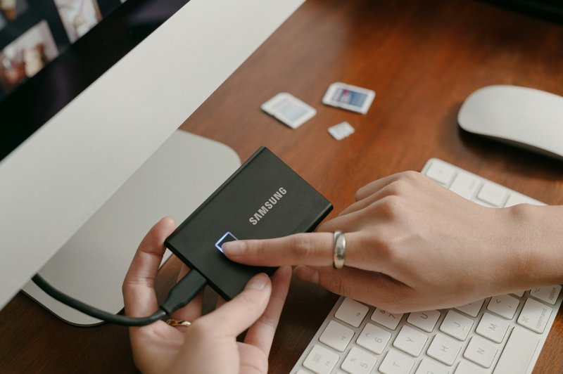 A Samsung external hard drive being used