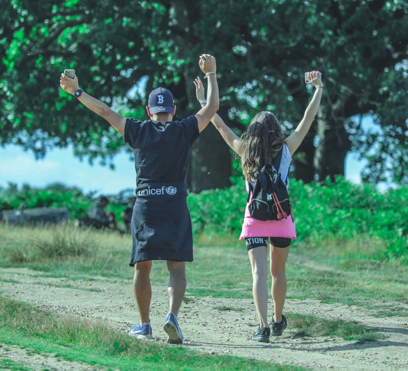  Two people celebrate to end of the route.