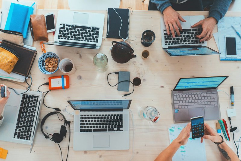 Group study session with tech essentials