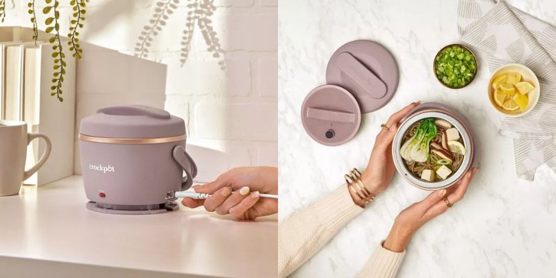 A pair of hands holding the crock pot electric lunch box