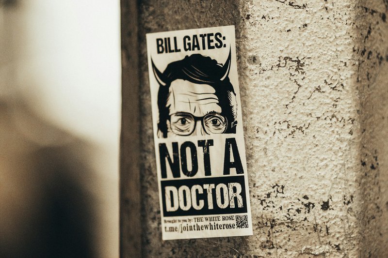 a sticker on the side of a building that says not a doctor