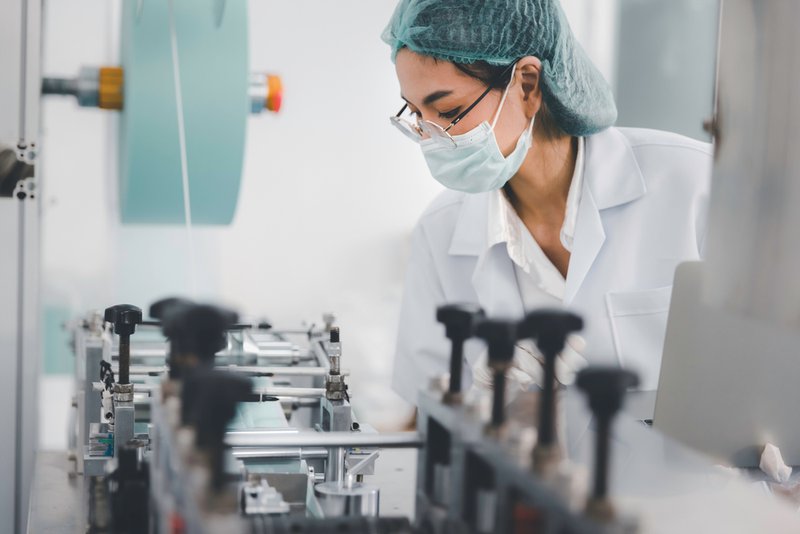 Scientist working on supplement formulation.