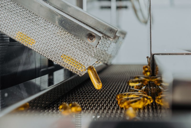 Supplement products being manufactured in capsule form.