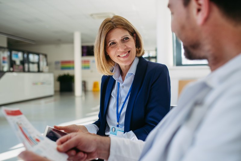 Pharmaceutical representative finalizing a manufacturing partnership