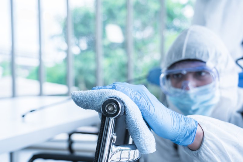 Professional protocols focus on proper containment and disposal of contaminated materials.
