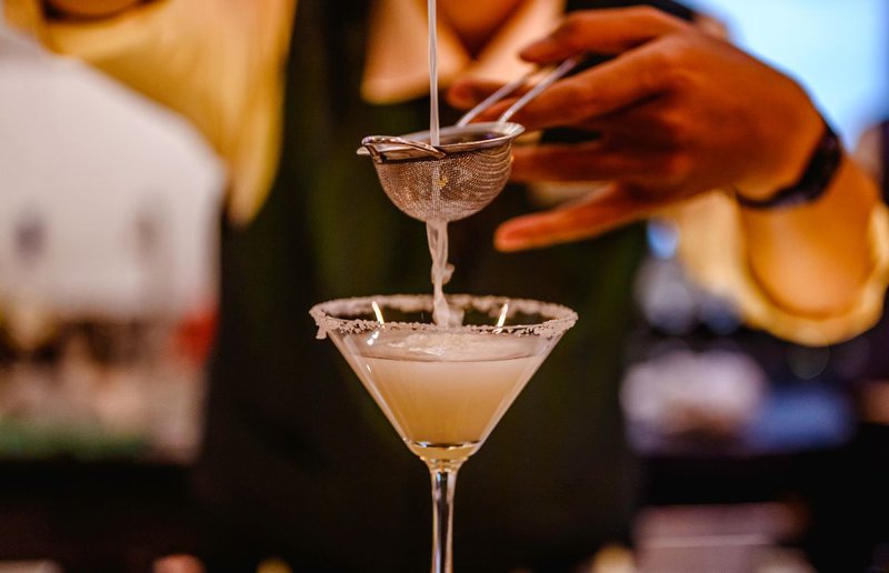 A beverage being created with cloud emulsion systems