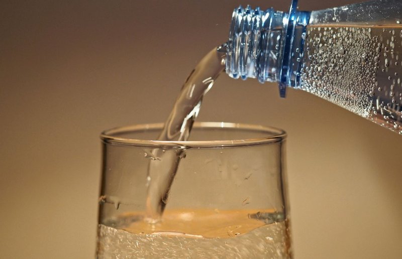 vitamin water with flavor masking agents poured into a glass