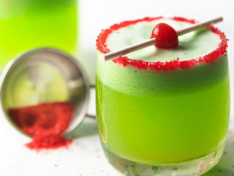 green liquid in clear drinking glass