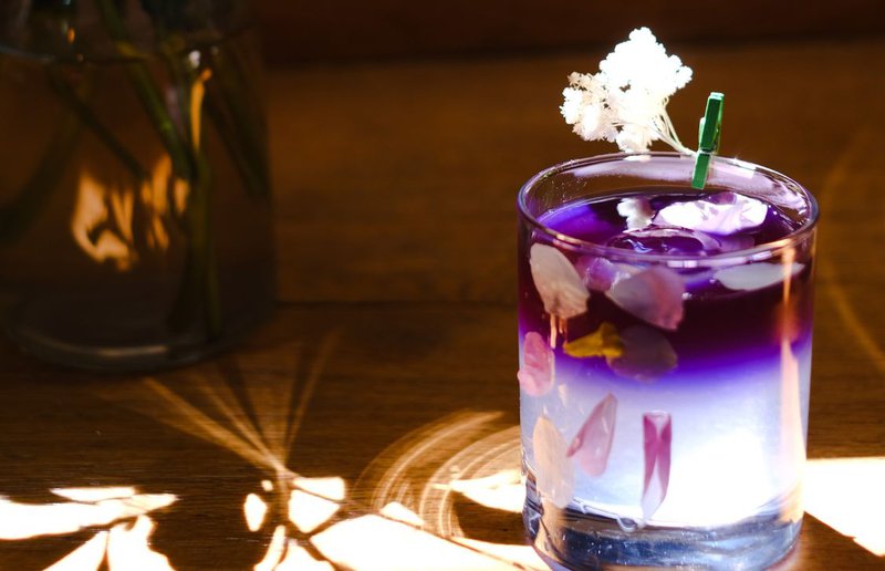 A berry drink created with berry and floral profiles