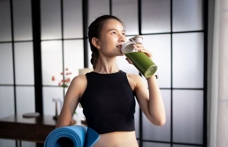 woman drinking pea protein