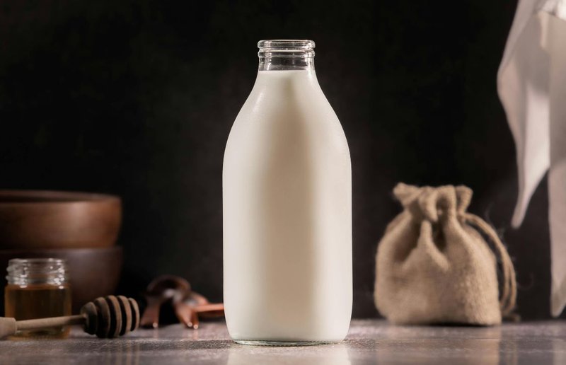 A glass bottle of dairy milk