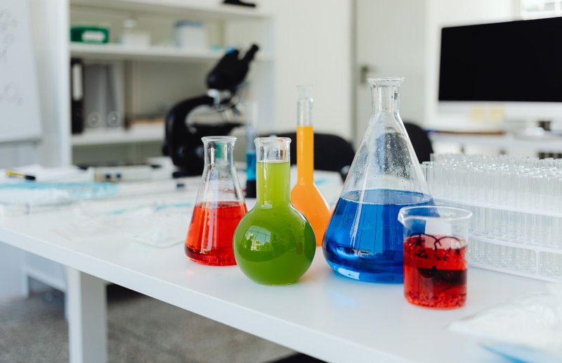 food flavoring companies sample flavors in lab