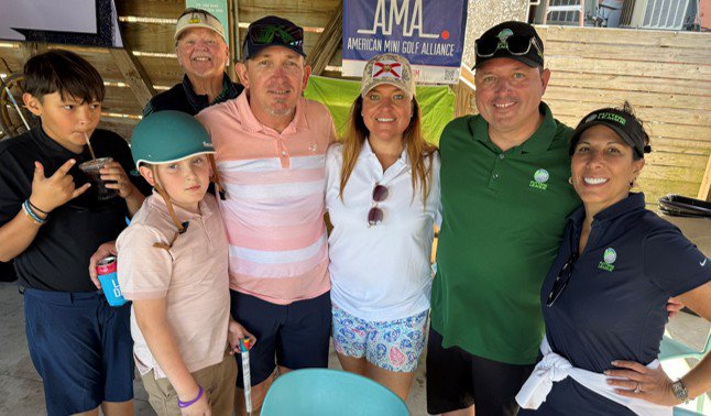 Inclusive sports community at a mini golf gathering