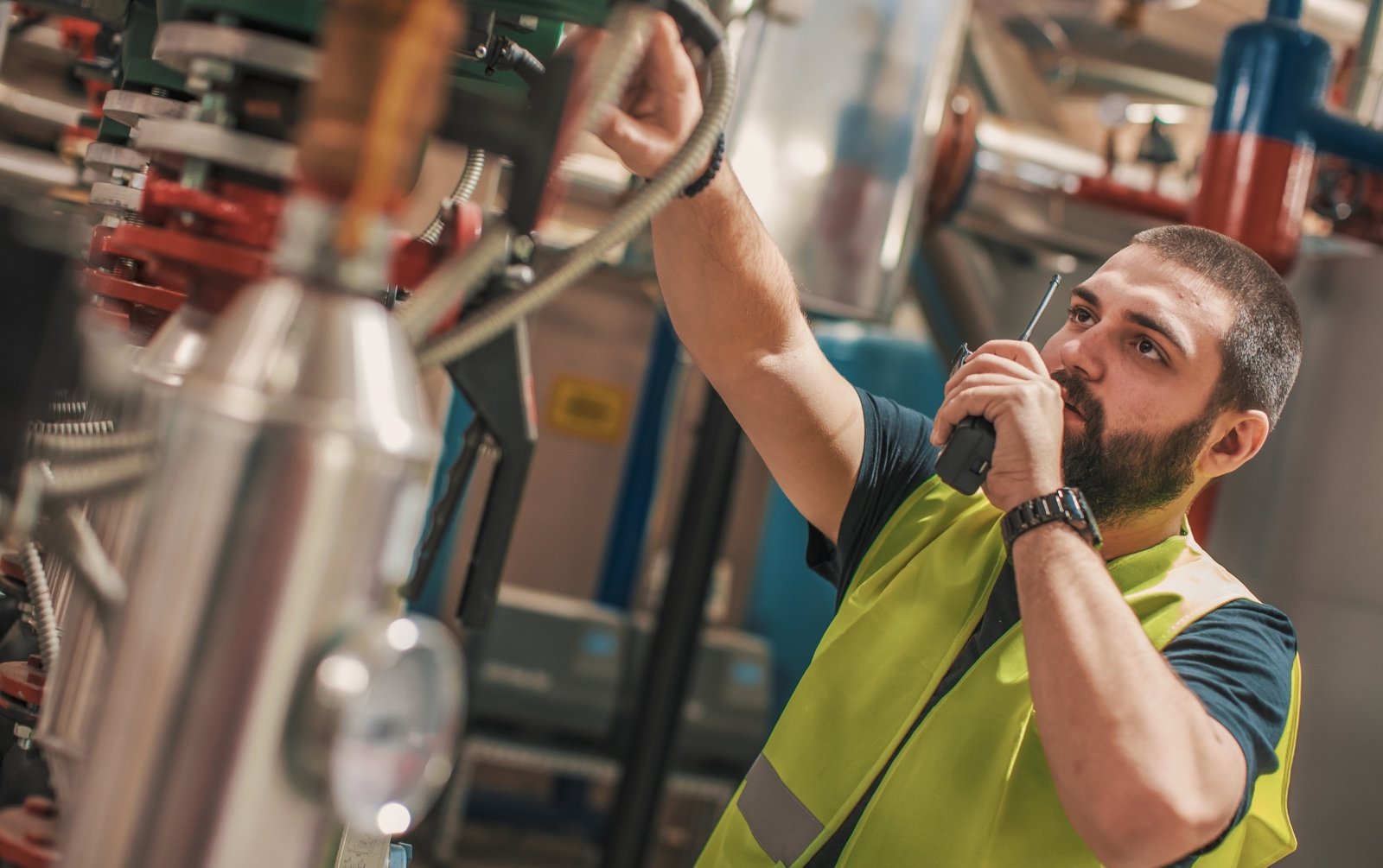 Boiler engineer inspecting proper steam distribution.