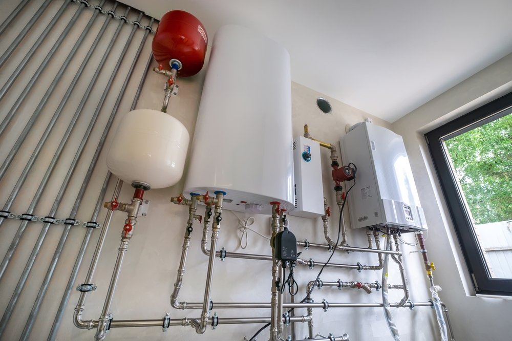 Modern boiler installed in home basement Modern boiler installed in home basement