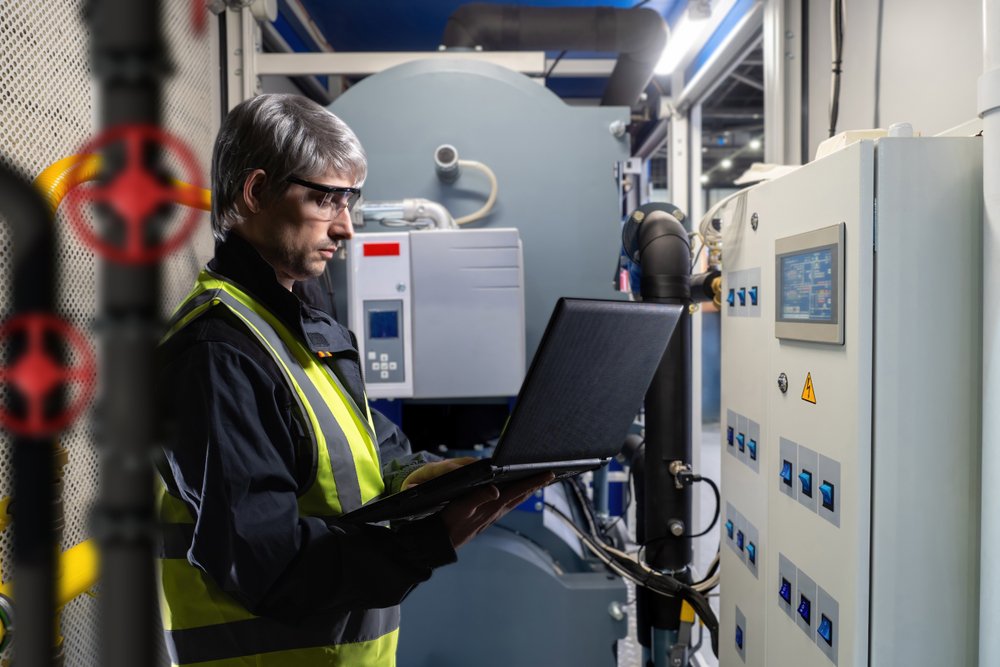 Mechanical engineer conducting boiler upgrades.