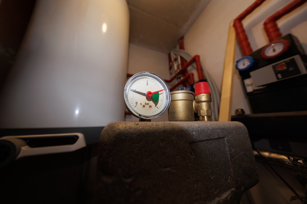 Boiler gauge in a boiler room.