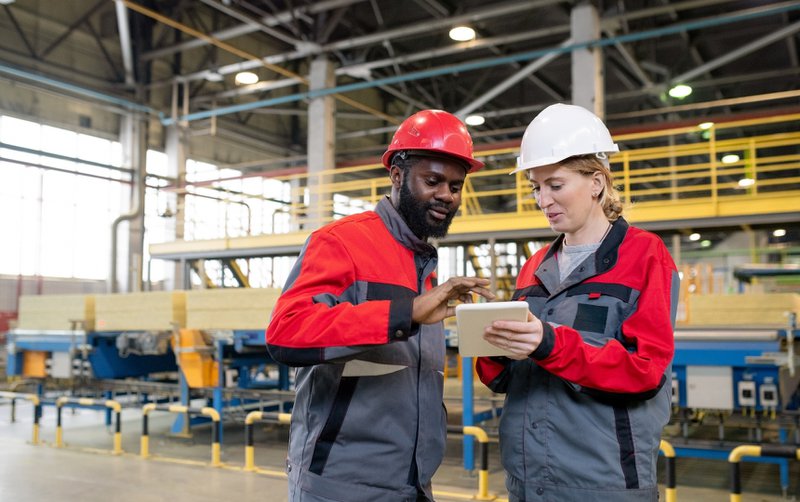 Logistics team members using MT programs to track shipment