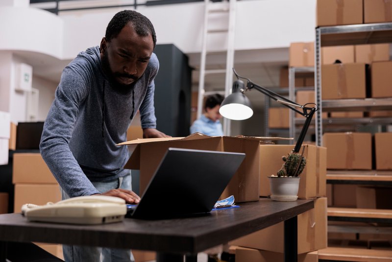 Man checking audit data on computer