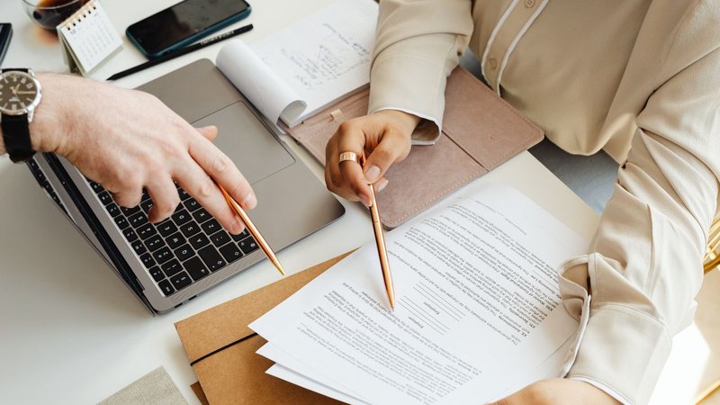 cost of dental malpractice insurance dentist reviewing policy documents