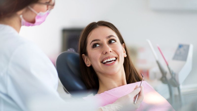 dentist improving patient communication to reduce malpractice risk