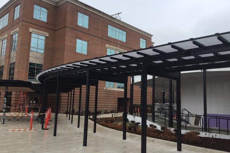 A walkway canopy system at a college